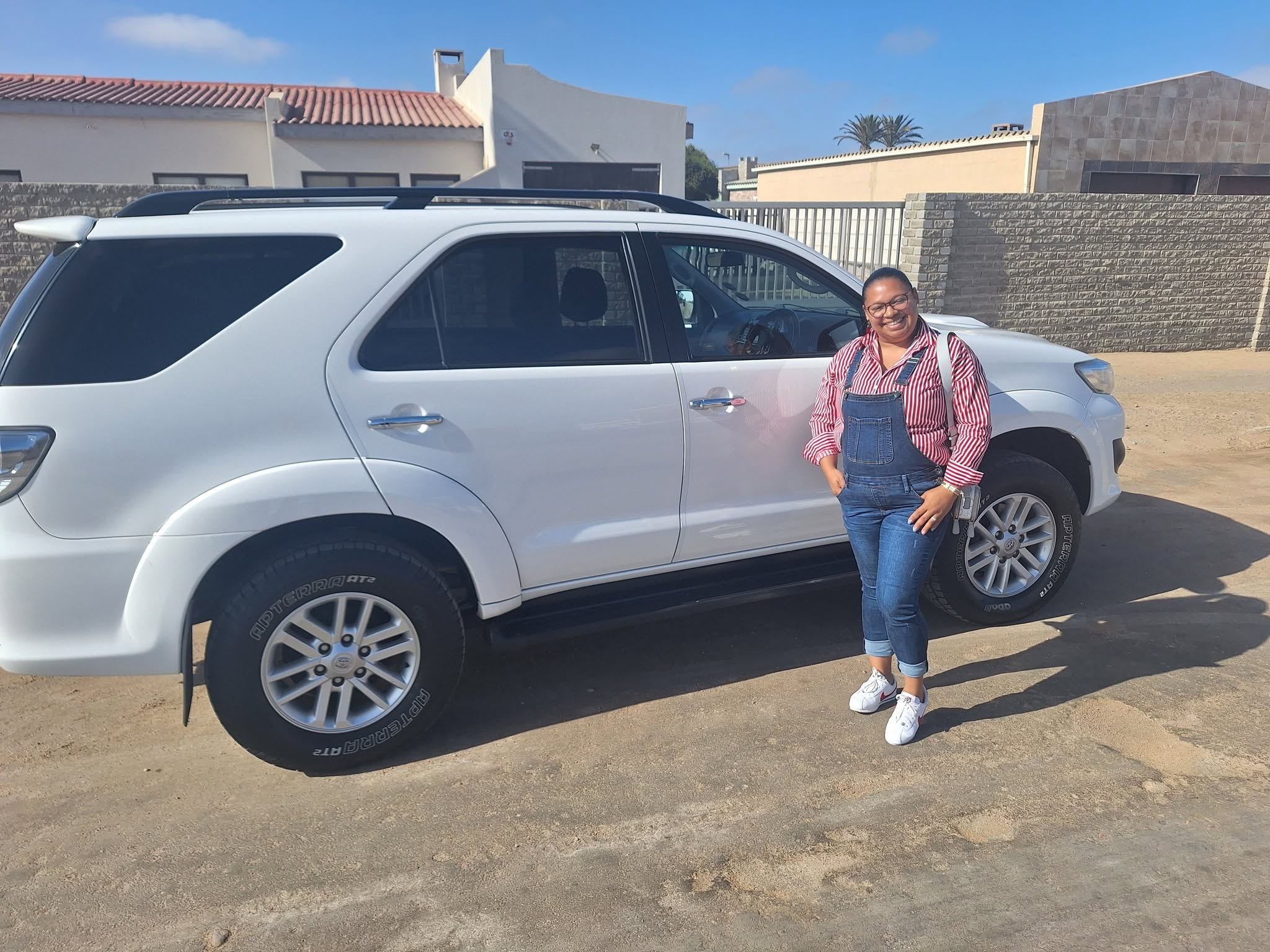 Customer collecting a Chika's Toyota Fortuner